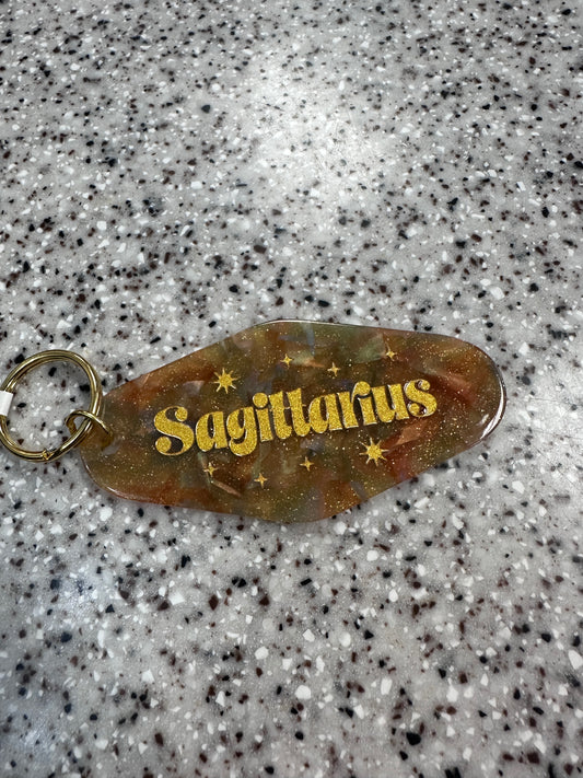 "What’s Your Sign?" Horoscope Zodiac Hotel Style Keychain